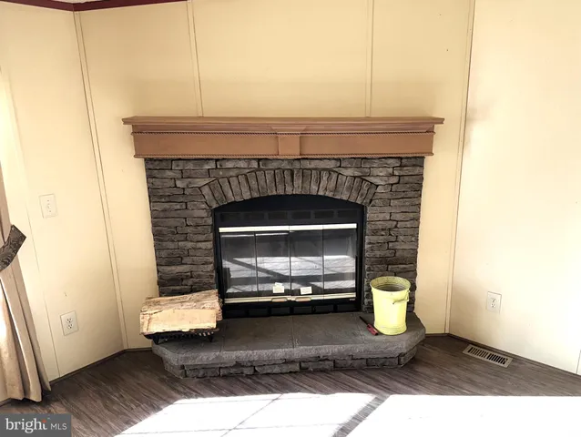 a living room with a fireplace