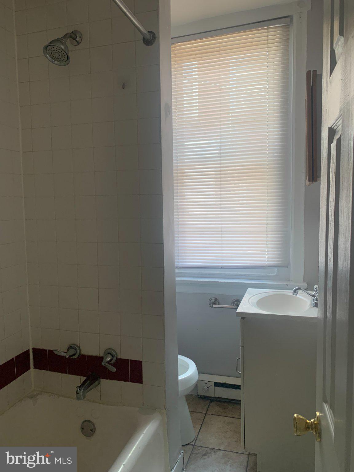 1026 Fillmore Street, Unit 2 Philadelphia, PA 19124 - Photo 7 of 7 Bright and functional bathroom space.