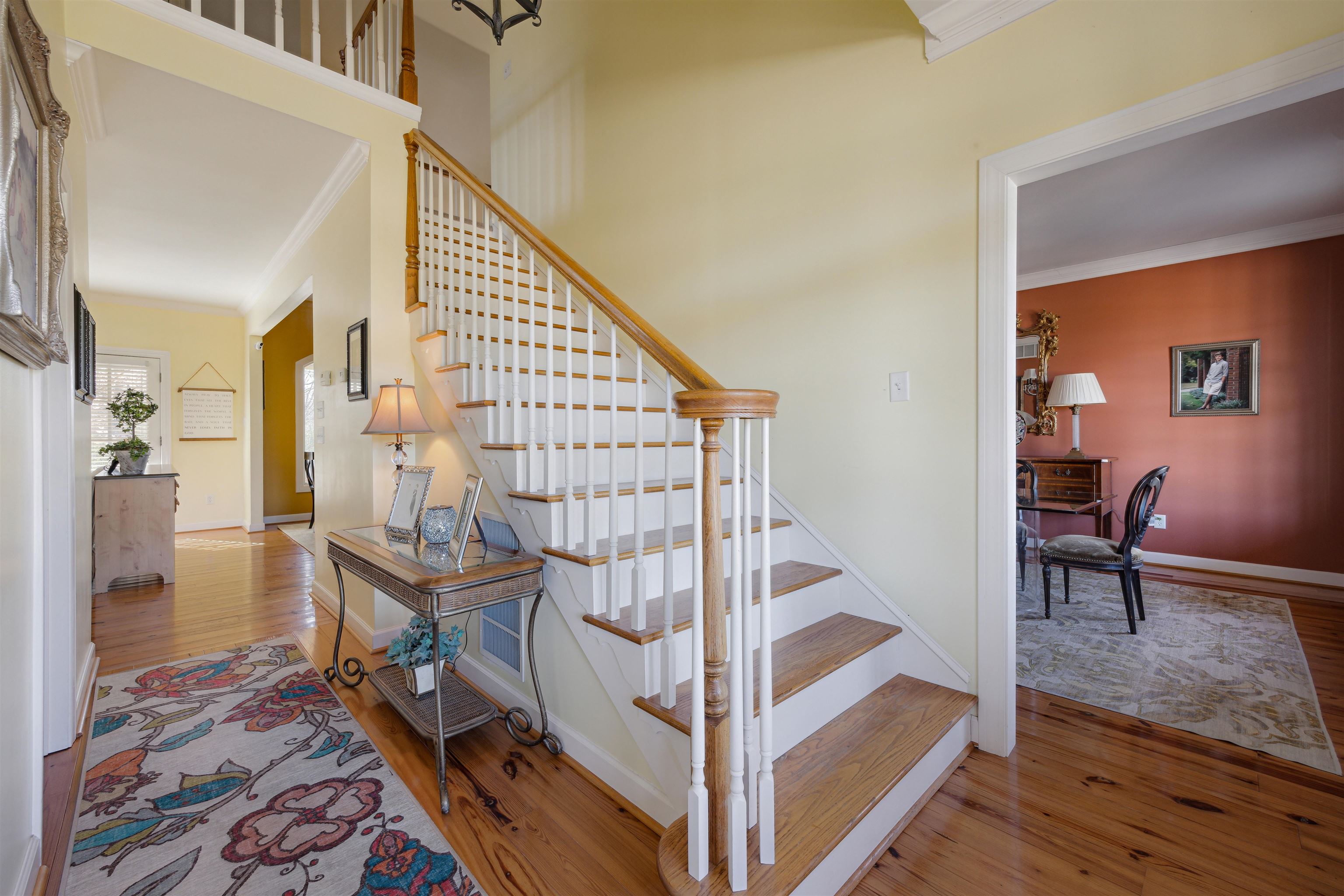 5460 Old Jackson Road Somerville, TN 38068 - Photo 7 of 40 Stairway featuring crown molding, baseboards, and wood finished floors