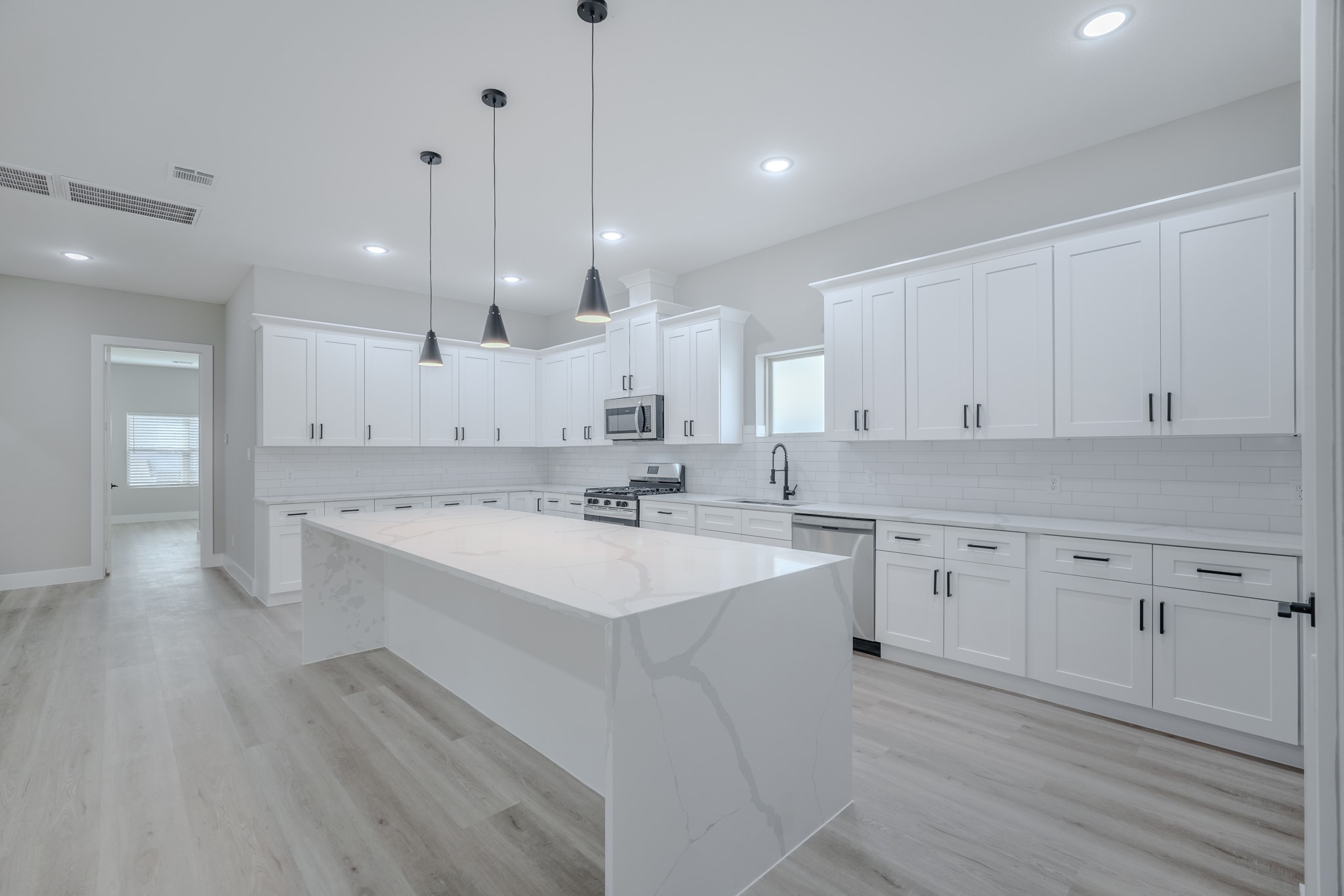 Charming single-story home featuring 3 spacious bedrooms, a fully upgraded kitchen with modern finishes, and a light-filled open layout that invites warmth and comfort into every corner.