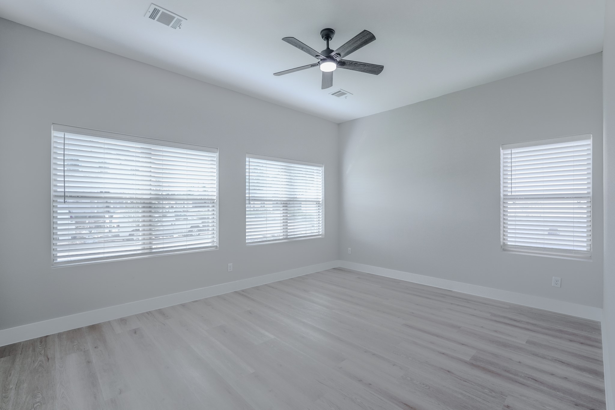 2618 Piemonte Avenue Cir Spring Spring, TX 77388 - Photo 22 of 50 Primary suite retreat with large windows and serene backyard views