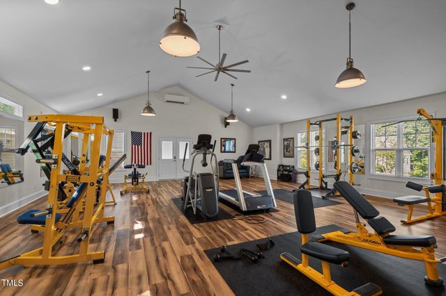 a view of porch with wooden floor and furniture