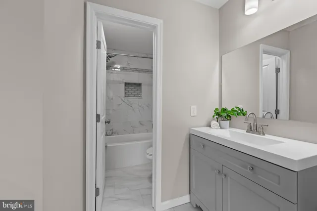 a bed room with a bed and a table