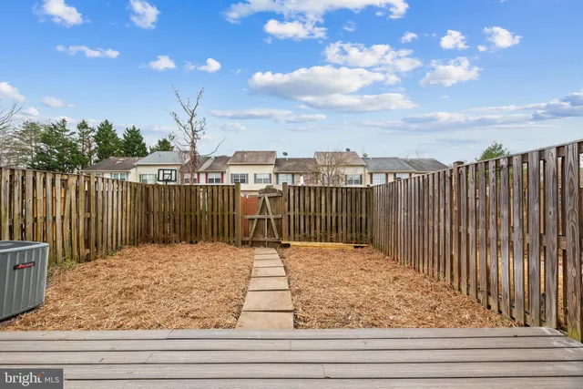 a balcony view with a wooden floor