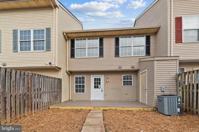 a front view of a house with a porch