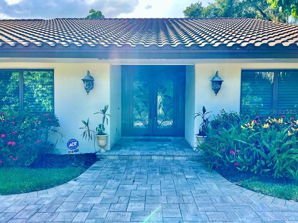 5610 West Lake Butler Road Windermere, FL 34786 - Photo 1 of 32 a front view of a house