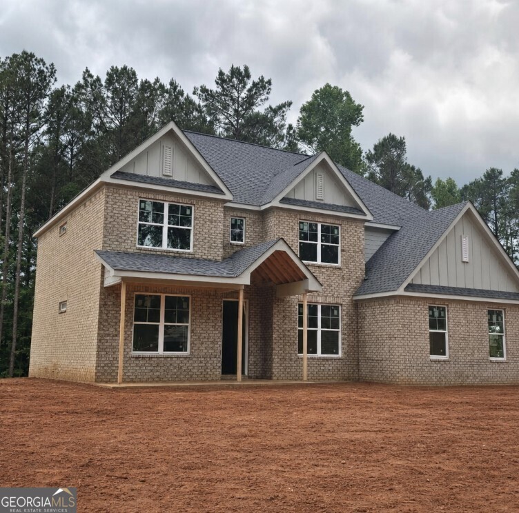 112 Patillo Manor, Unit 3 Stockbridge, GA 30281 - Photo 2 of 59 Elegant four-sides brick construction offers timeless curb appeal, durability, and low-maintenance living.