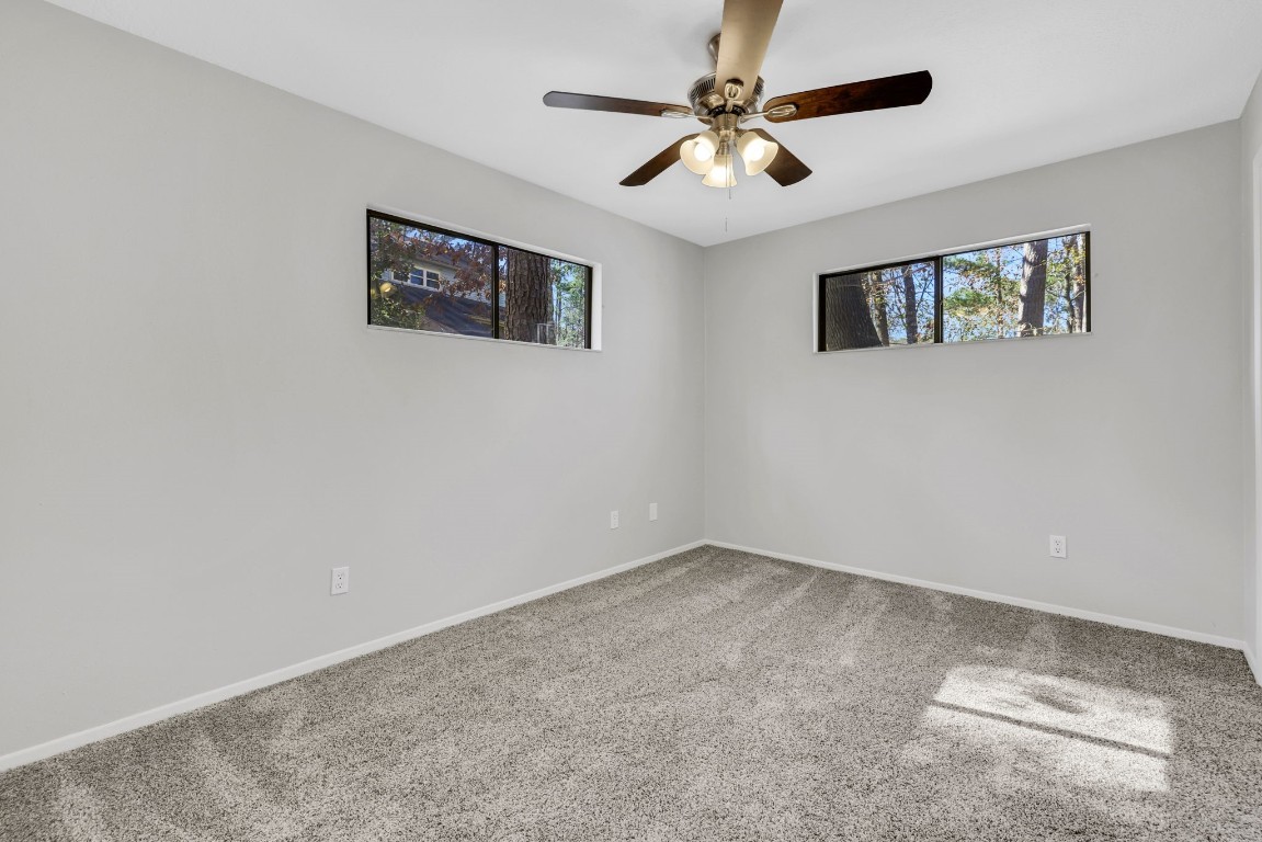 330 North Fairway Loop Coldspring, TX 77331 - Photo 23 of 40 a view of an empty room