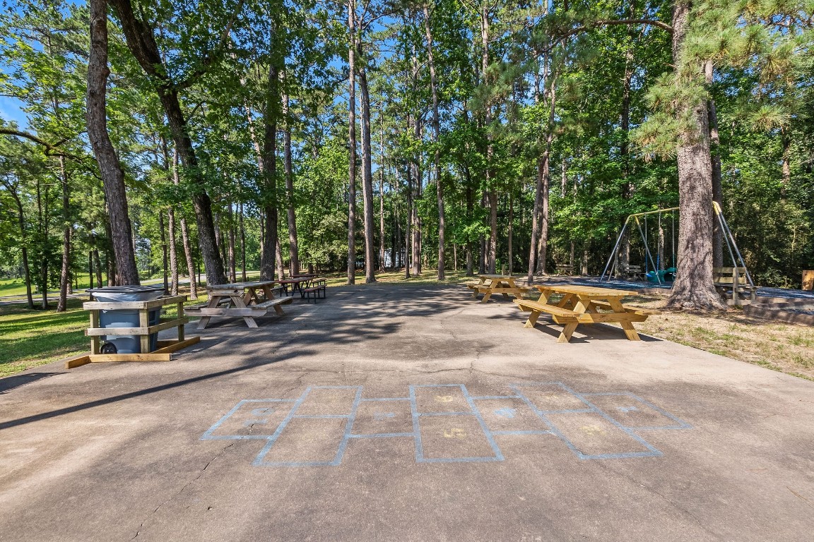 330 North Fairway Loop Coldspring, TX 77331 - Photo 35 of 40 a view of swimming pool with chairs