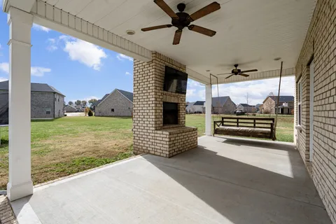 a view of a living room with a flat screen tv