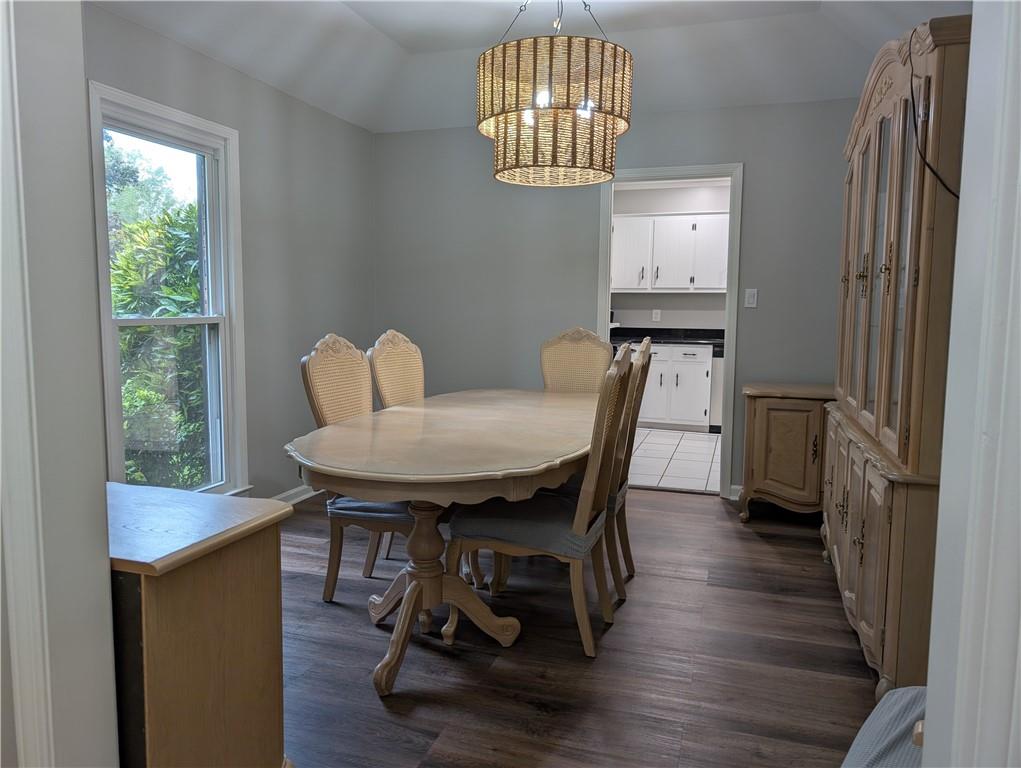 402 Pheasant Run Rome, GA 30161 - Photo 26 of 74 a view of a dining room with furniture and wooden floor