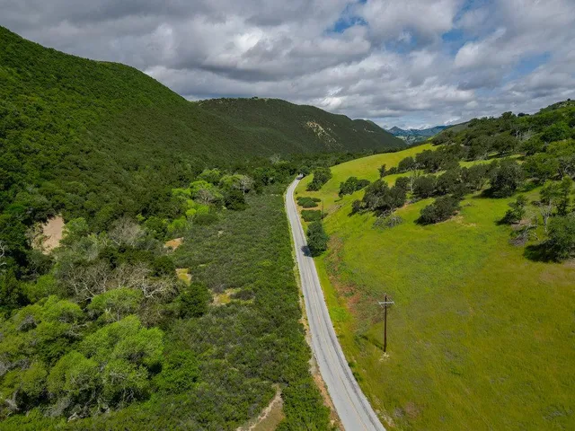 a view of a lake with a mountain in the background