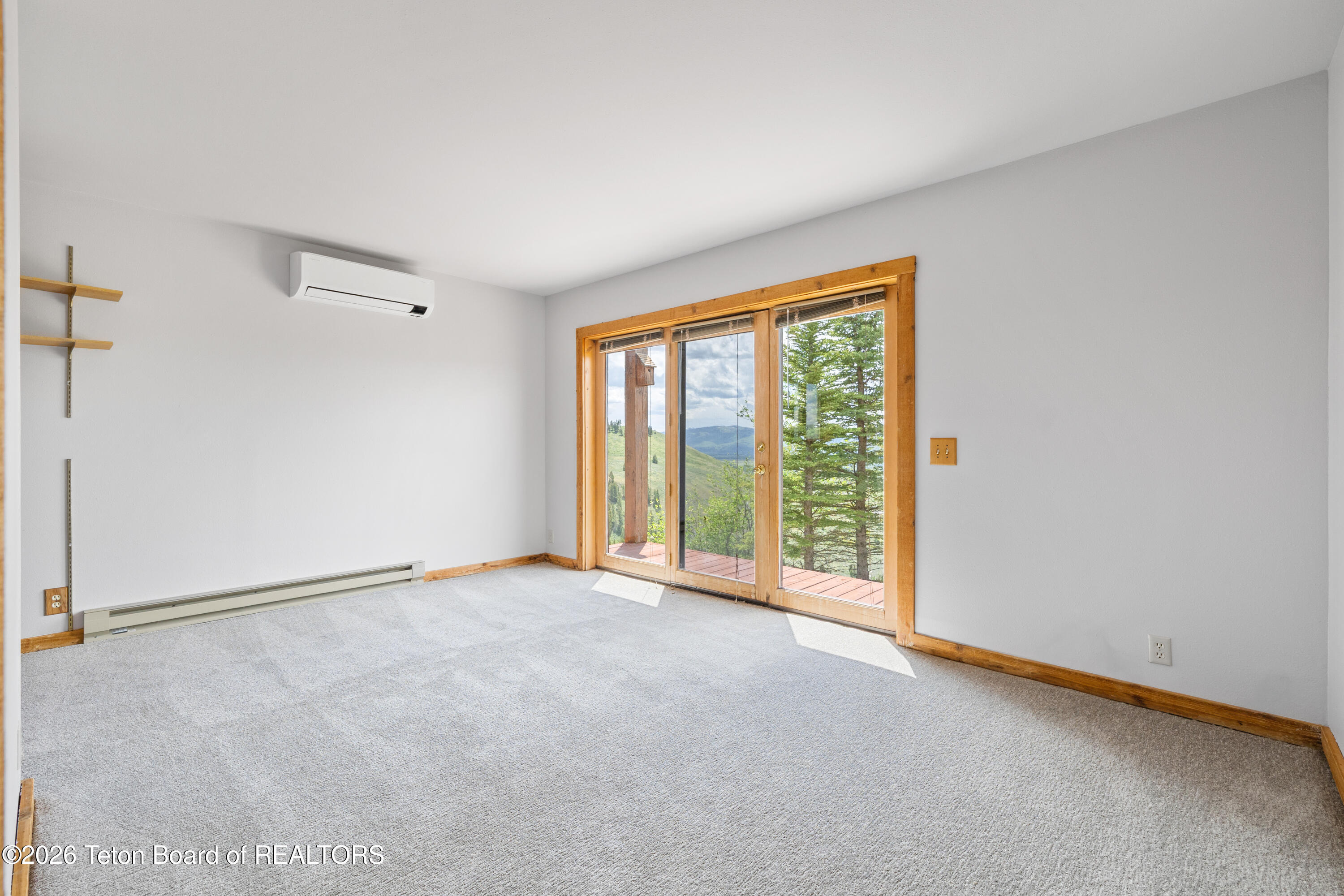 555 Ridgeview Drive Jackson, WY 83001 - Photo 12 of 23 12 Downstairs Bedroom 1