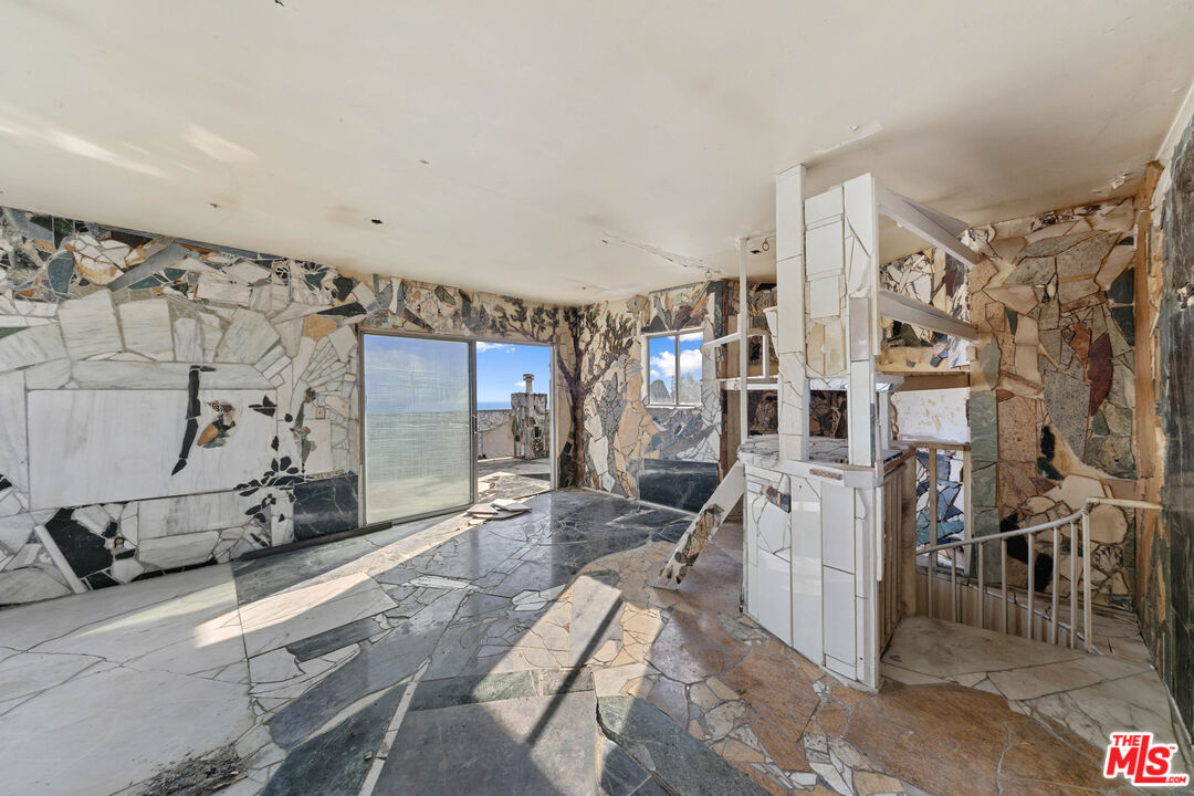 24641 Piuma Road Malibu, CA 90265 - Photo 27 of 40 a view of a room with gym equipment