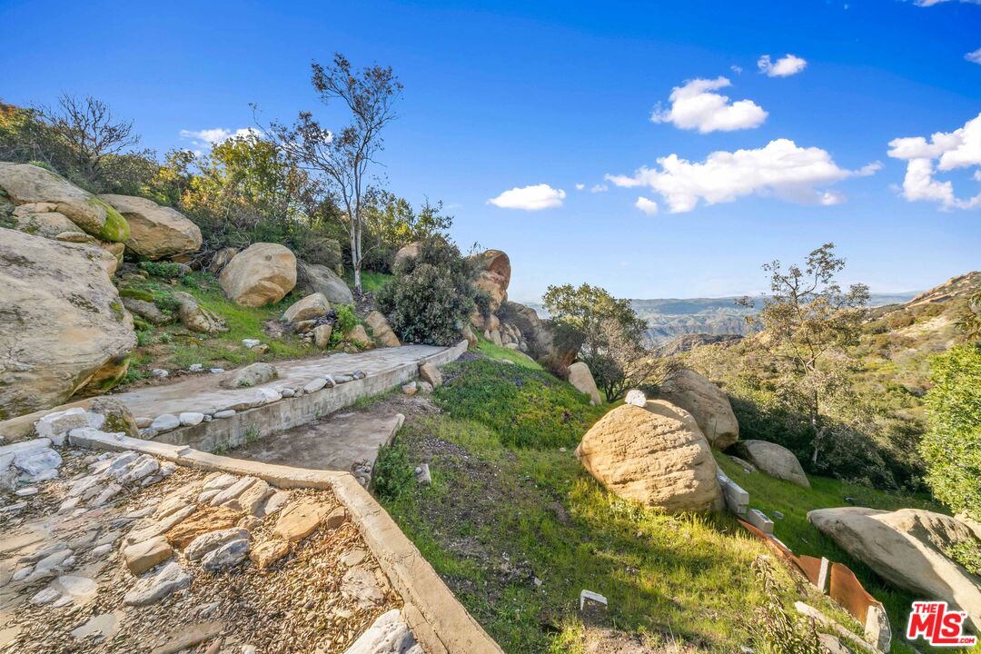 24641 Piuma Road Malibu, CA 90265 - Photo 35 of 40 a view of a backyard of the house