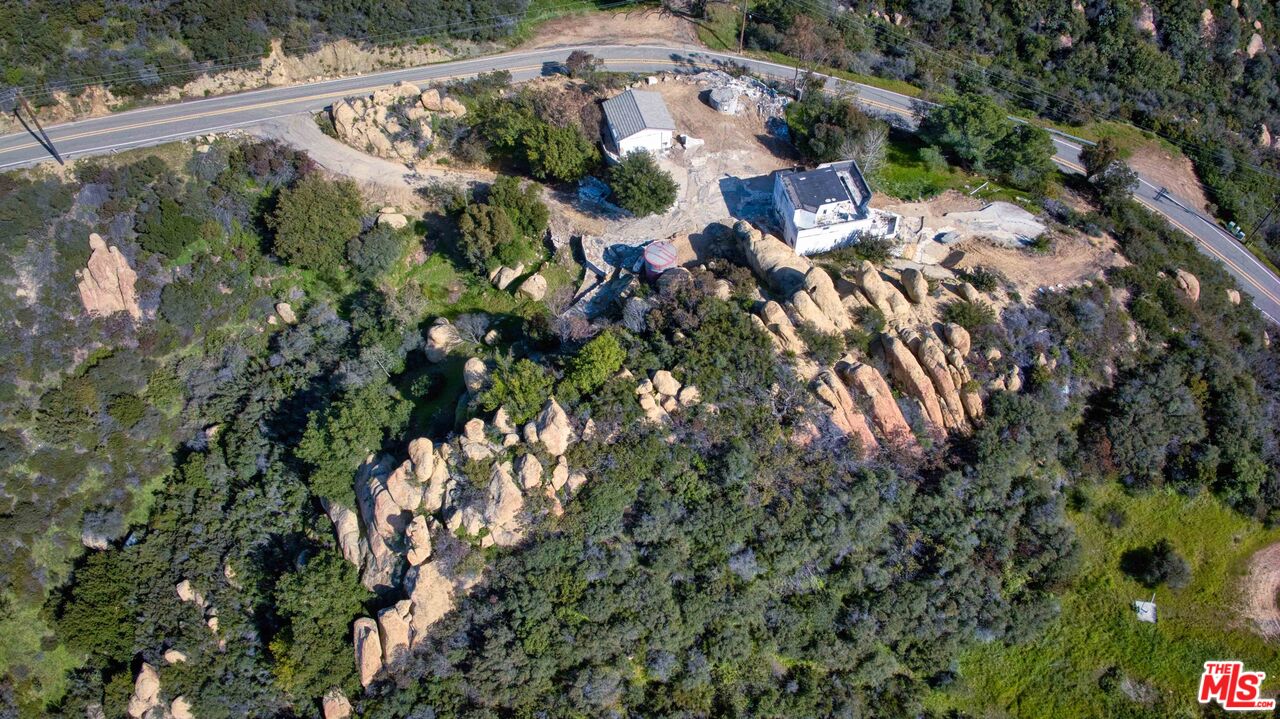 24641 Piuma Road Malibu, CA 90265 - Photo 38 of 40 an aerial view of residential house with outdoor space and trees all around