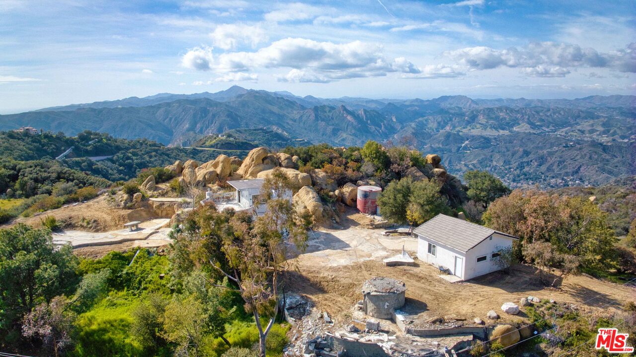 24641 Piuma Road Malibu, CA 90265 - Photo 39 of 40 a view of a lot of trees and houses