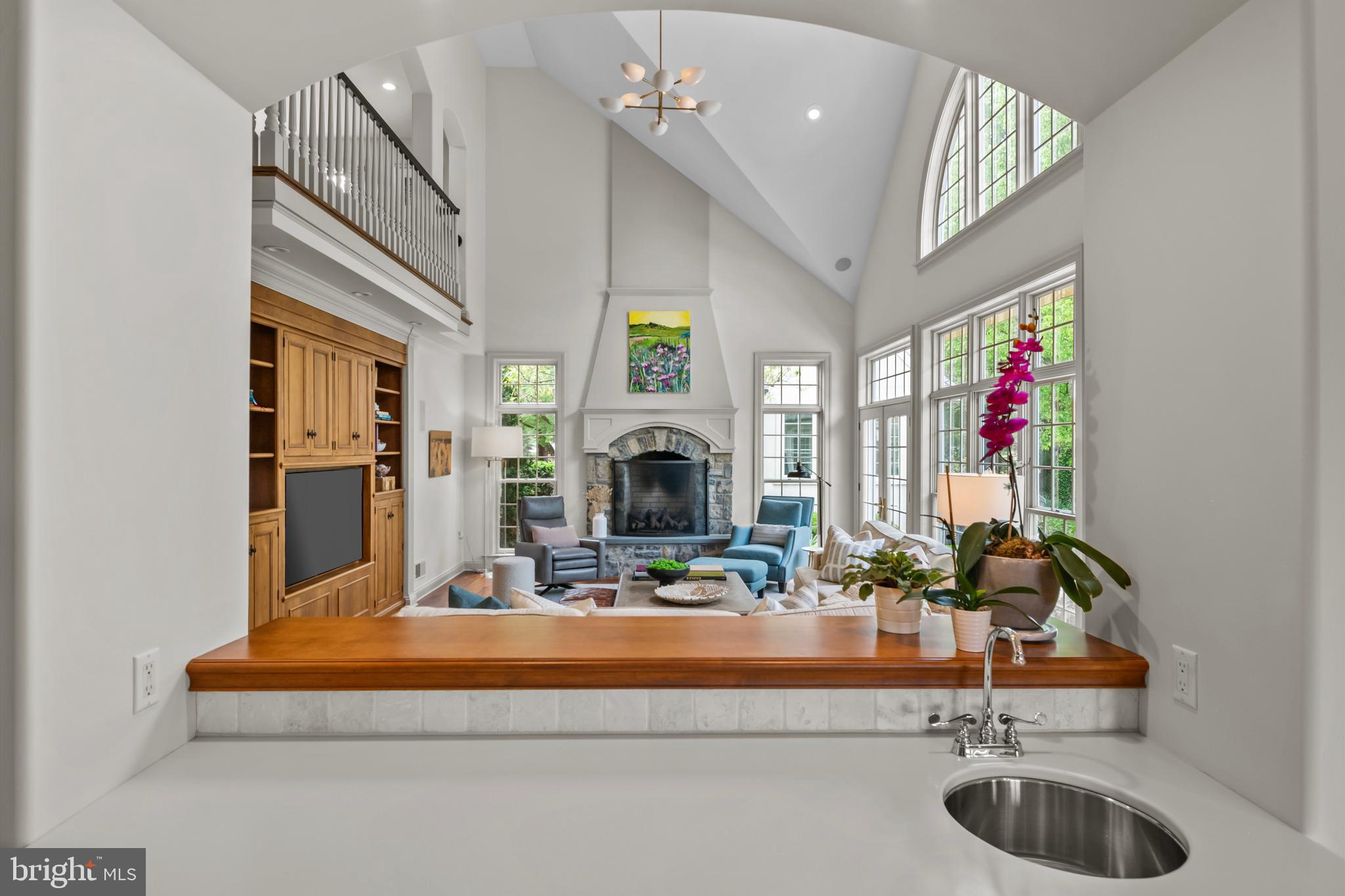 901 Greenside Drive Lititz, PA 17543 - Photo 18 of 45 a living room with fireplace furniture and a chandelier