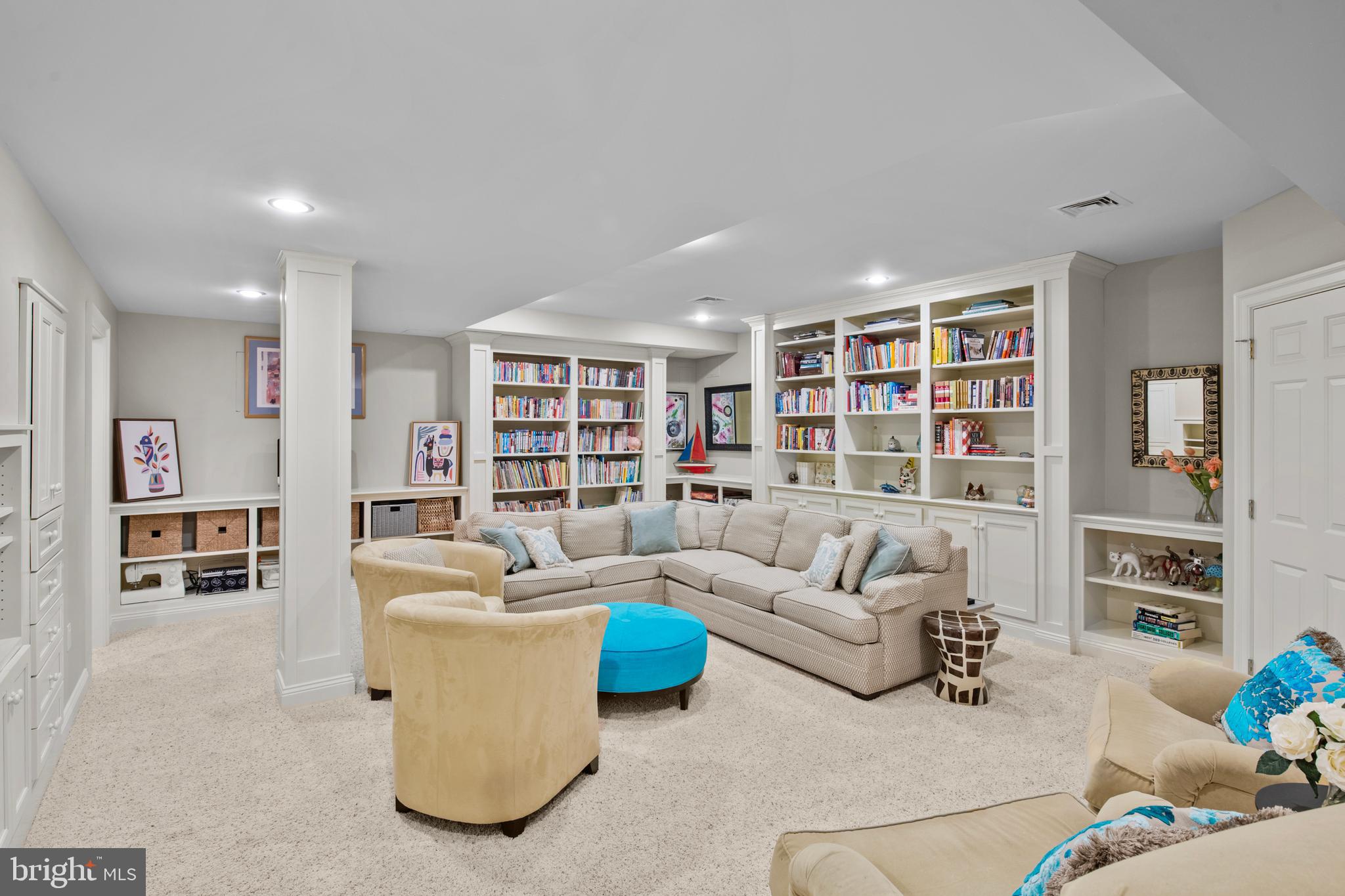 901 Greenside Drive Lititz, PA 17543 - Photo 35 of 45 a living room with furniture and a book shelf