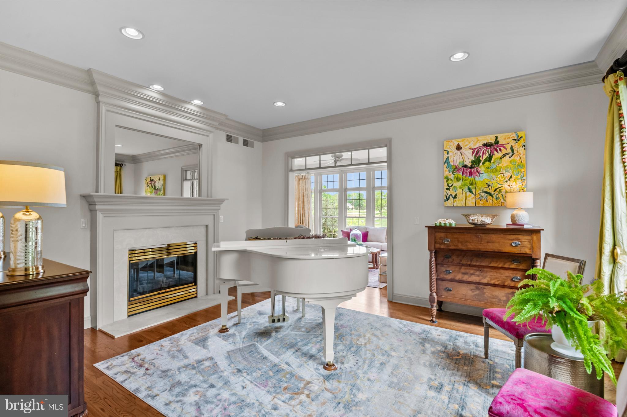 901 Greenside Drive Lititz, PA 17543 - Photo 4 of 45 a living room with furniture a fireplace and a table