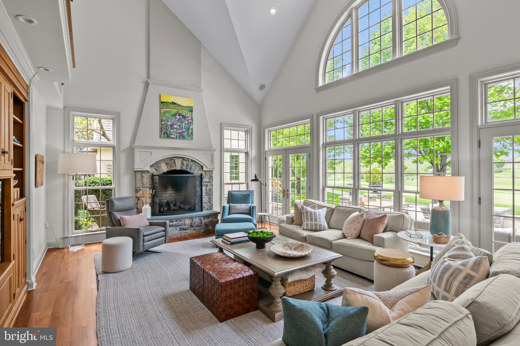 901 Greenside Drive Lititz, PA 17543 - Photo 5 of 45 a living room with furniture large window and a fireplace