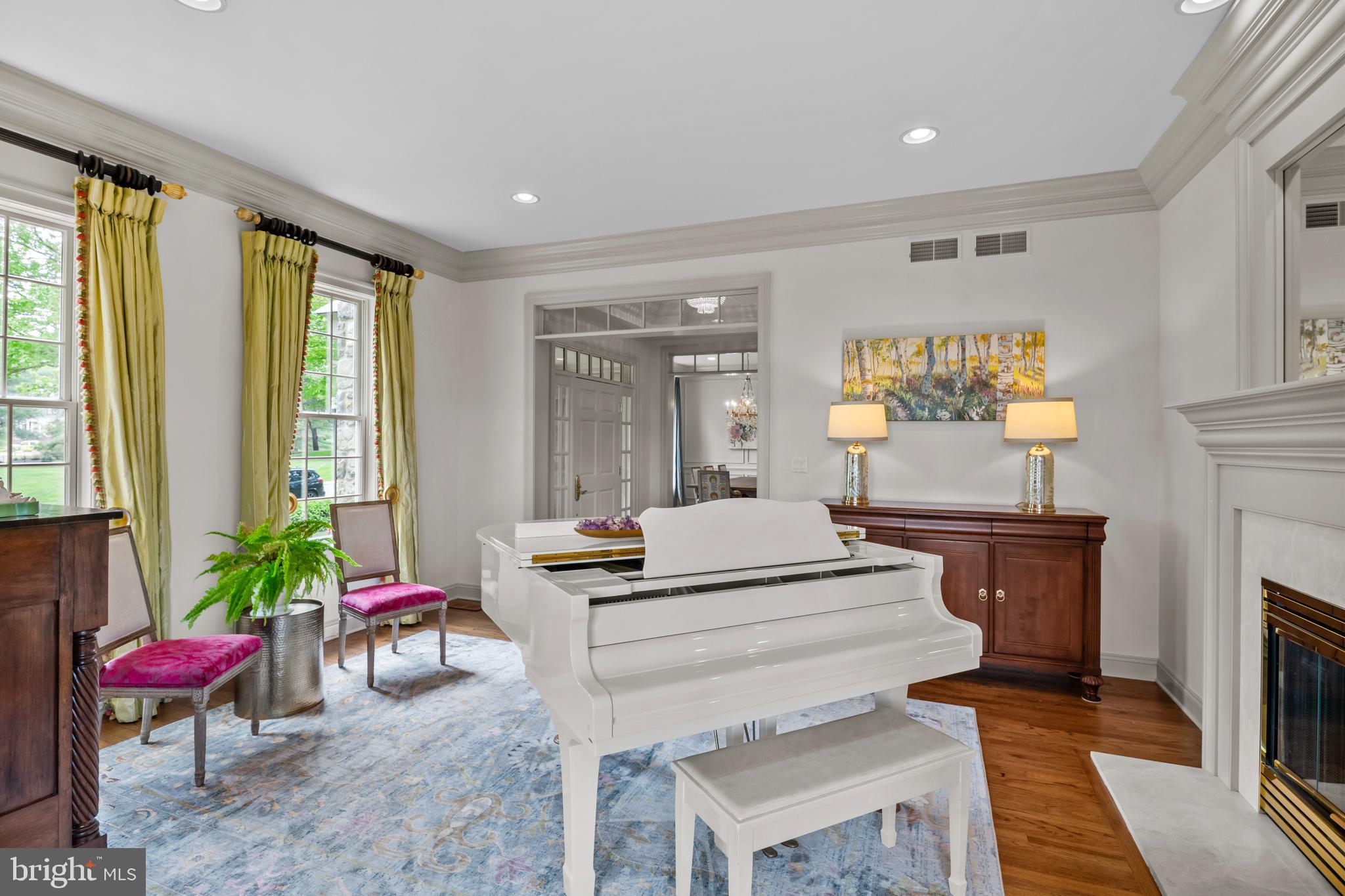 901 Greenside Drive Lititz, PA 17543 - Photo 10 of 45 a living room with furniture a fireplace and a table