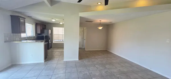 a view of a kitchen with a sink
