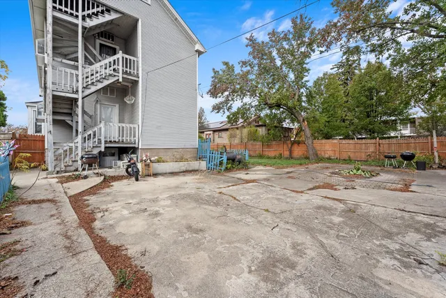 a view of a backyard of the house