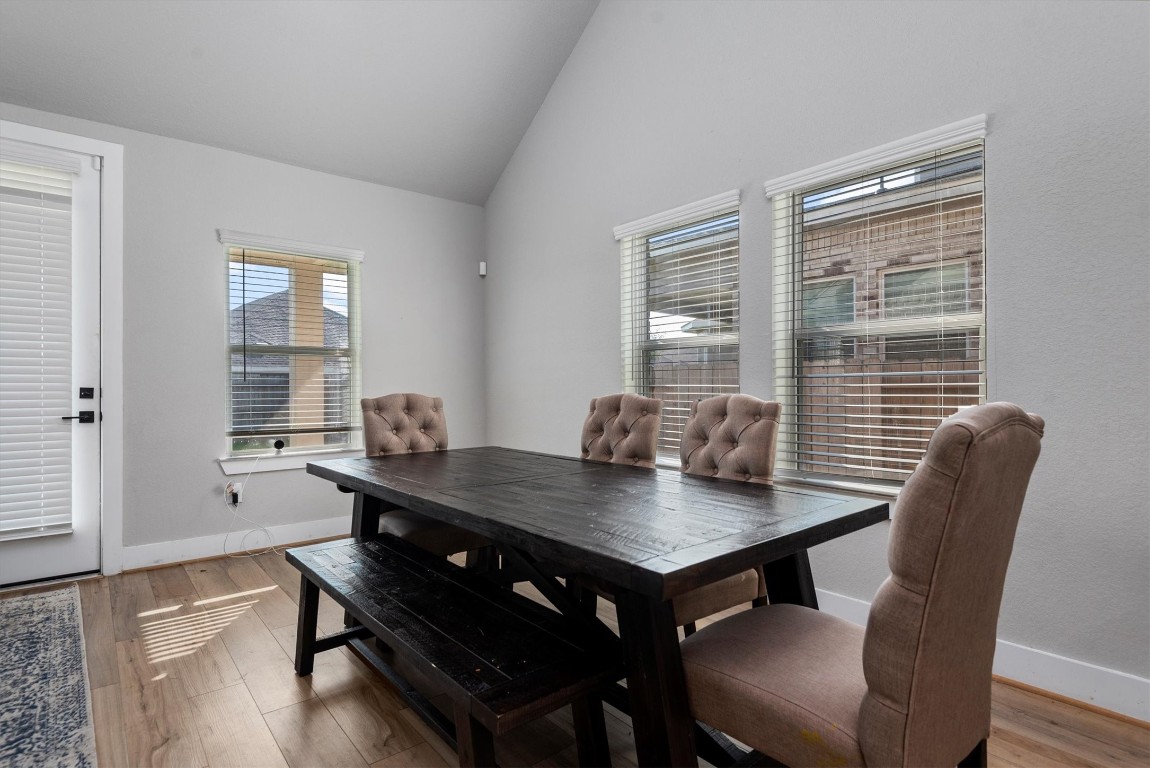 17828 Hanson Ridge Drive Montgomery, TX 77316 - Photo 12 of 47 a view of a dining room with furniture and window