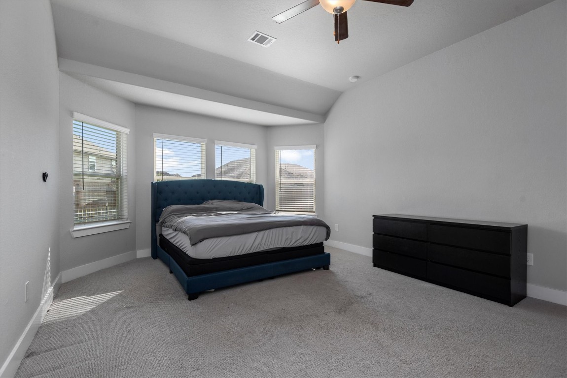 17828 Hanson Ridge Drive Montgomery, TX 77316 - Photo 22 of 47 a spacious bedroom with a bed and window