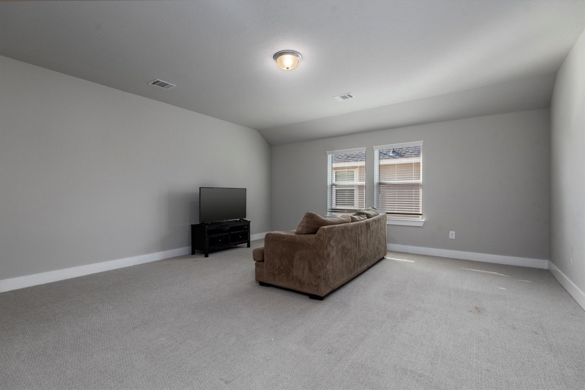 17828 Hanson Ridge Drive Montgomery, TX 77316 - Photo 28 of 47 a living room with furniture and window