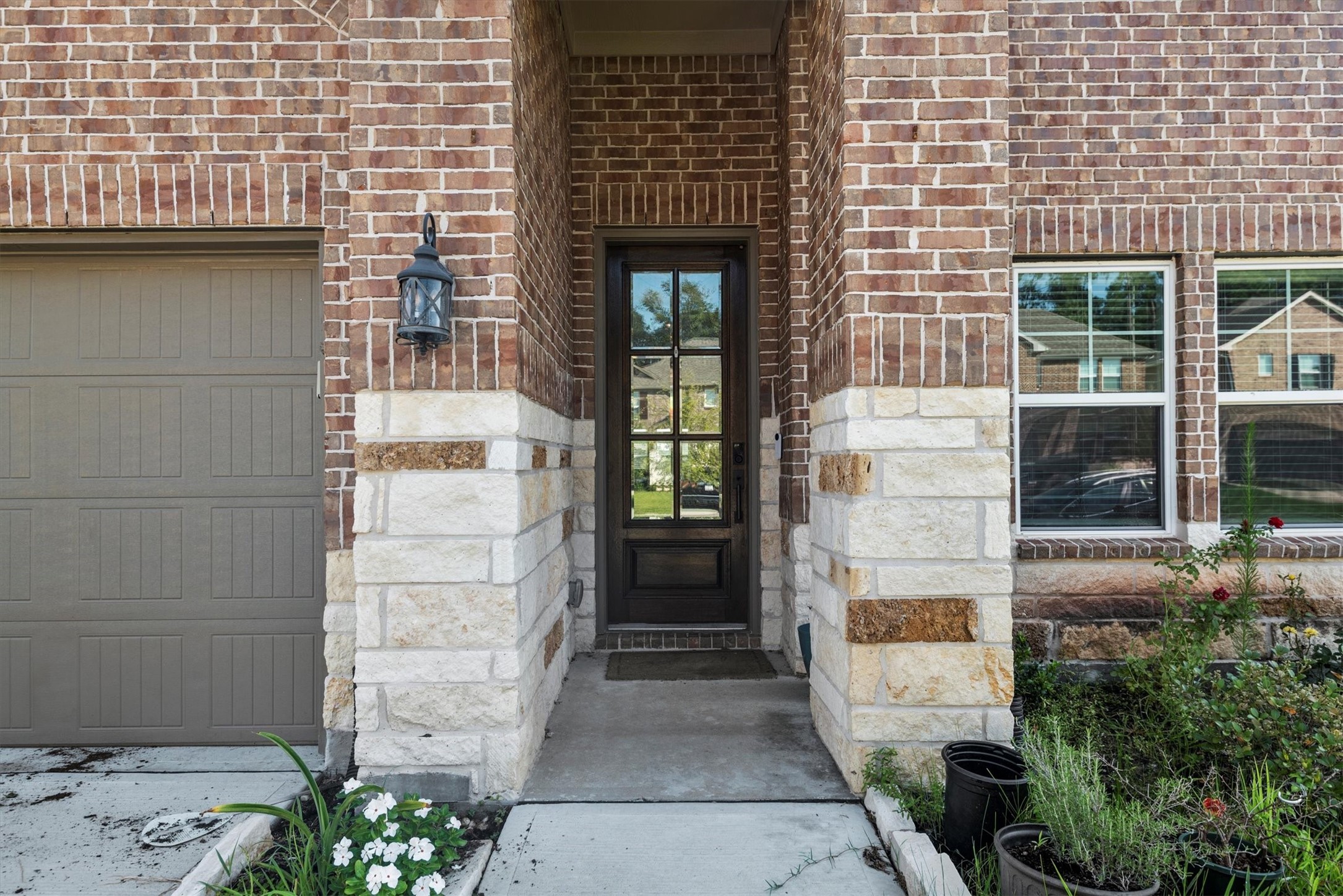 17828 Hanson Ridge Drive Montgomery, TX 77316 - Photo 3 of 47 a front view of a house with a door