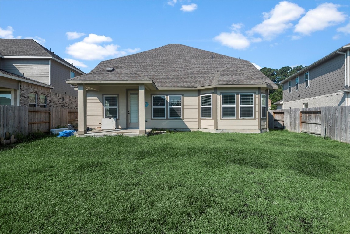 17828 Hanson Ridge Drive Montgomery, TX 77316 - Photo 44 of 47 a view of a house with yard and front view of a house