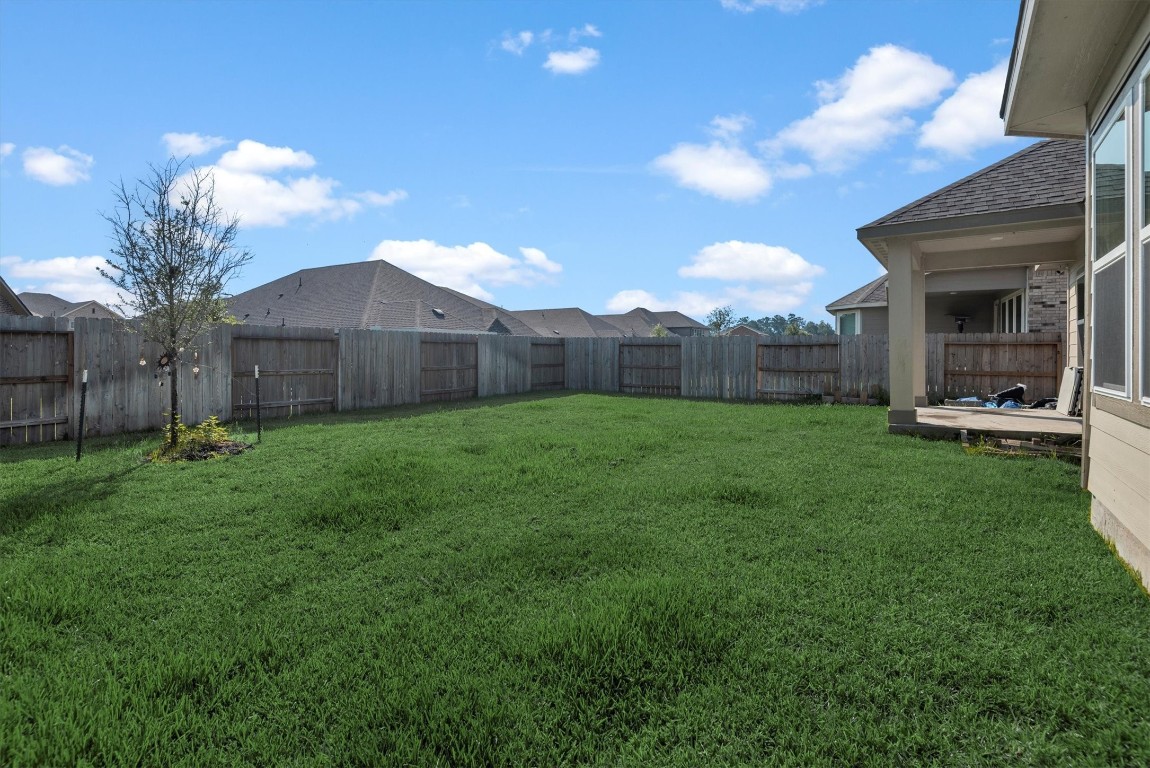 17828 Hanson Ridge Drive Montgomery, TX 77316 - Photo 46 of 47 a view of a back yard of the house