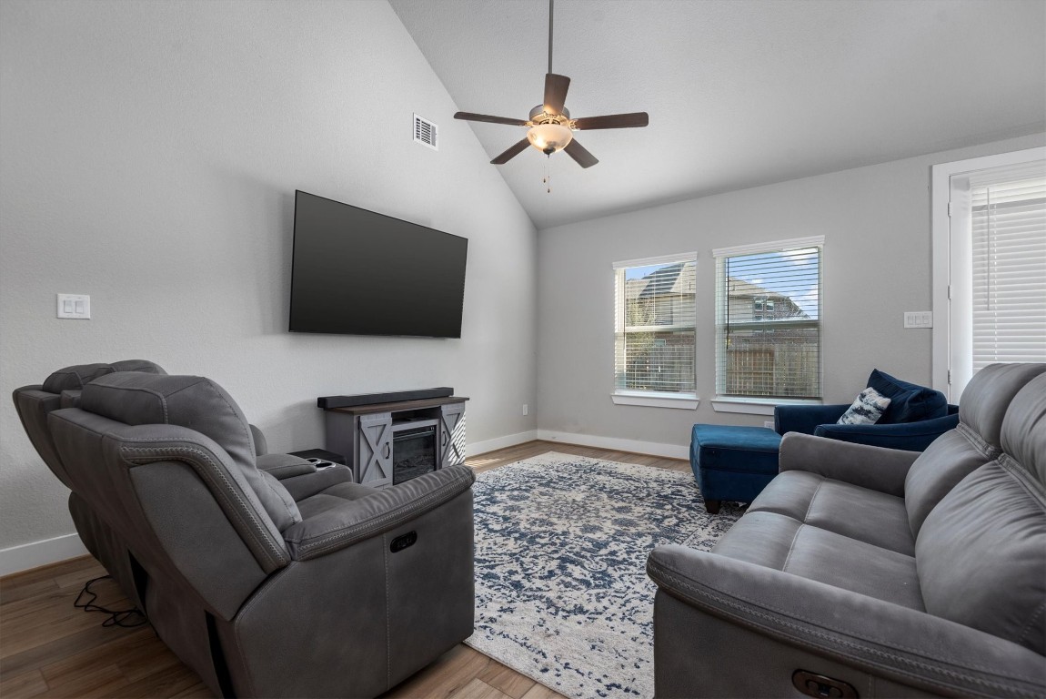 17828 Hanson Ridge Drive Montgomery, TX 77316 - Photo 9 of 47 a living room with furniture and a flat screen tv