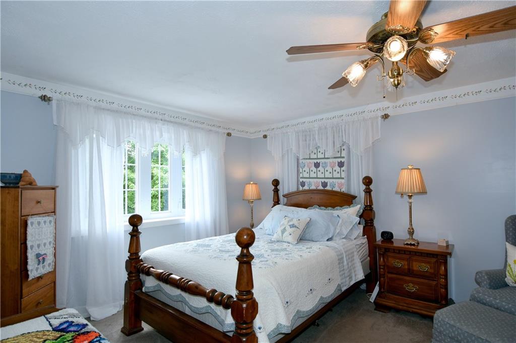 315 Ritter Road South Sewickley, PA 15143 - Photo 14 of 25 The master bedroom is generous in size and provides a ceiling fan.