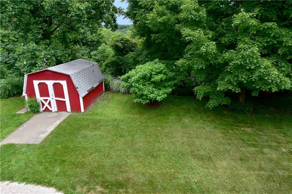 315 Ritter Road South Sewickley, PA 15143 - Photo 24 of 25 Mature trees border the rear yard creating privacy.