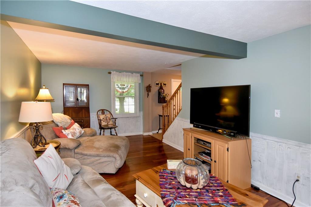 315 Ritter Road South Sewickley, PA 15143 - Photo 4 of 25 The family room is very spacious and is further enhanced with wainscoting.