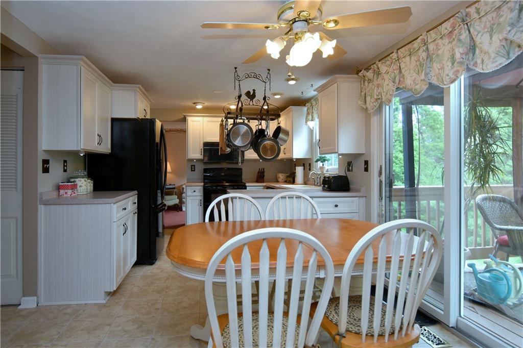315 Ritter Road South Sewickley, PA 15143 - Photo 8 of 25 Gather with family for meal time at the separate breakfast area with ceiling fan above.