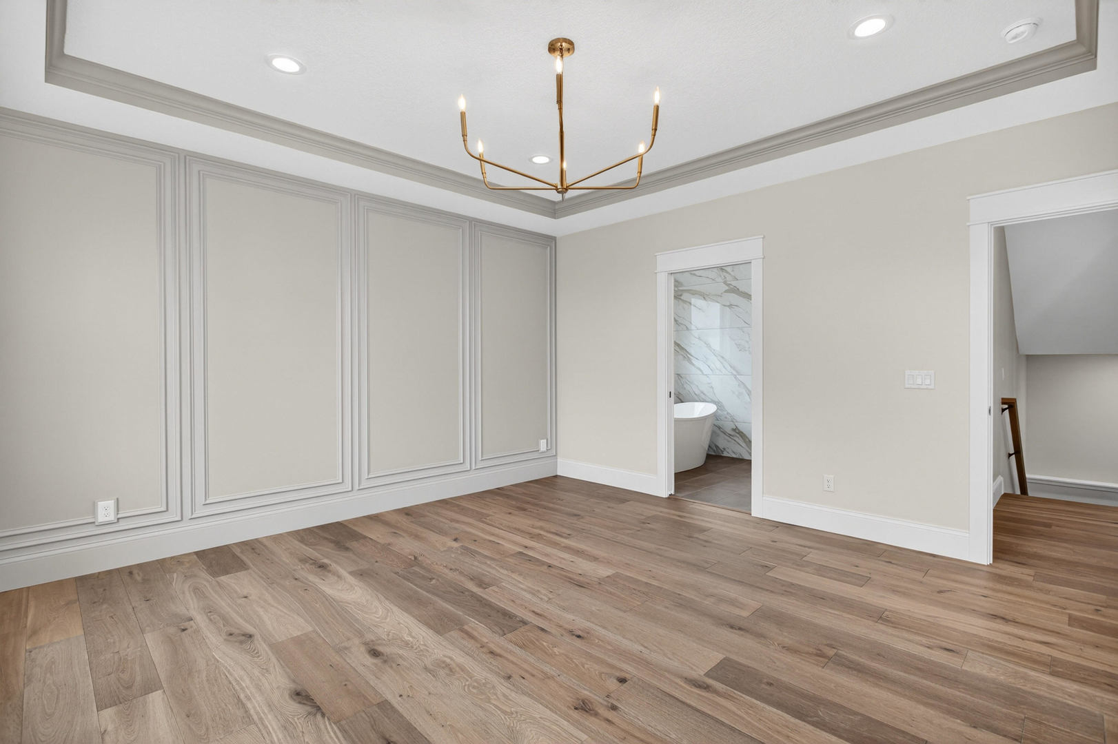 6928 Wilderness Pointe Bettendorf, IA 52722 - Photo 29 of 48 a view of empty room with wooden floor and ceiling fan