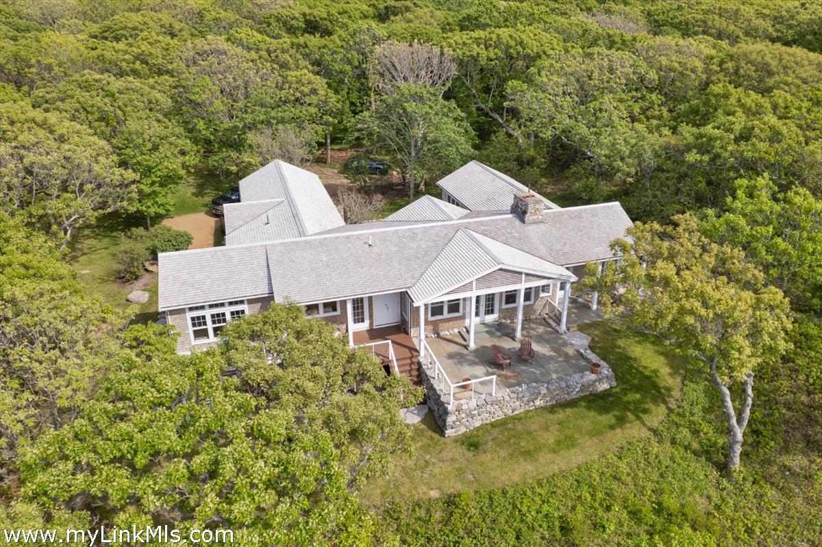 78 Hammett Road Chilmark, MA 02535 - Photo 5 of 53 an aerial view of a house with a yard and trees