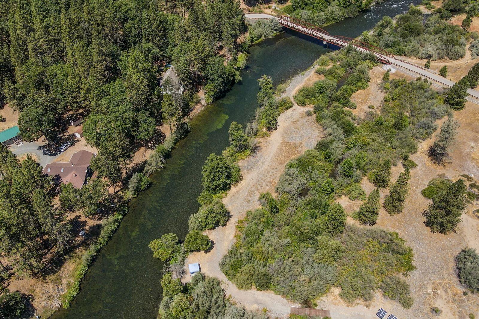 137 Salt Flat Road Lewiston, CA 96052 - Photo 23 of 26 an aerial view of a house with a yard and lake view