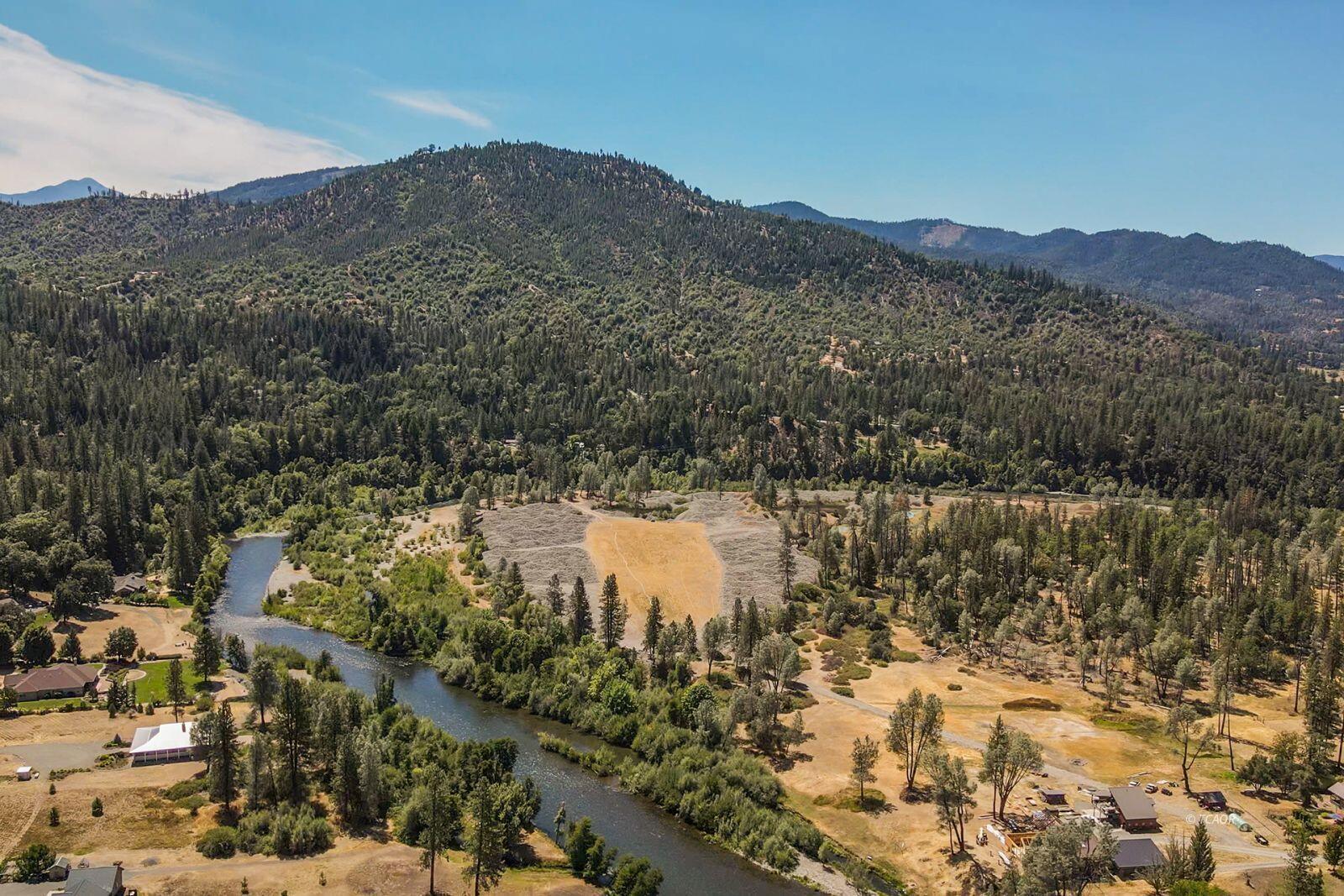 137 Salt Flat Road Lewiston, CA 96052 - Photo 24 of 26 a view of a lake with mountains in the background