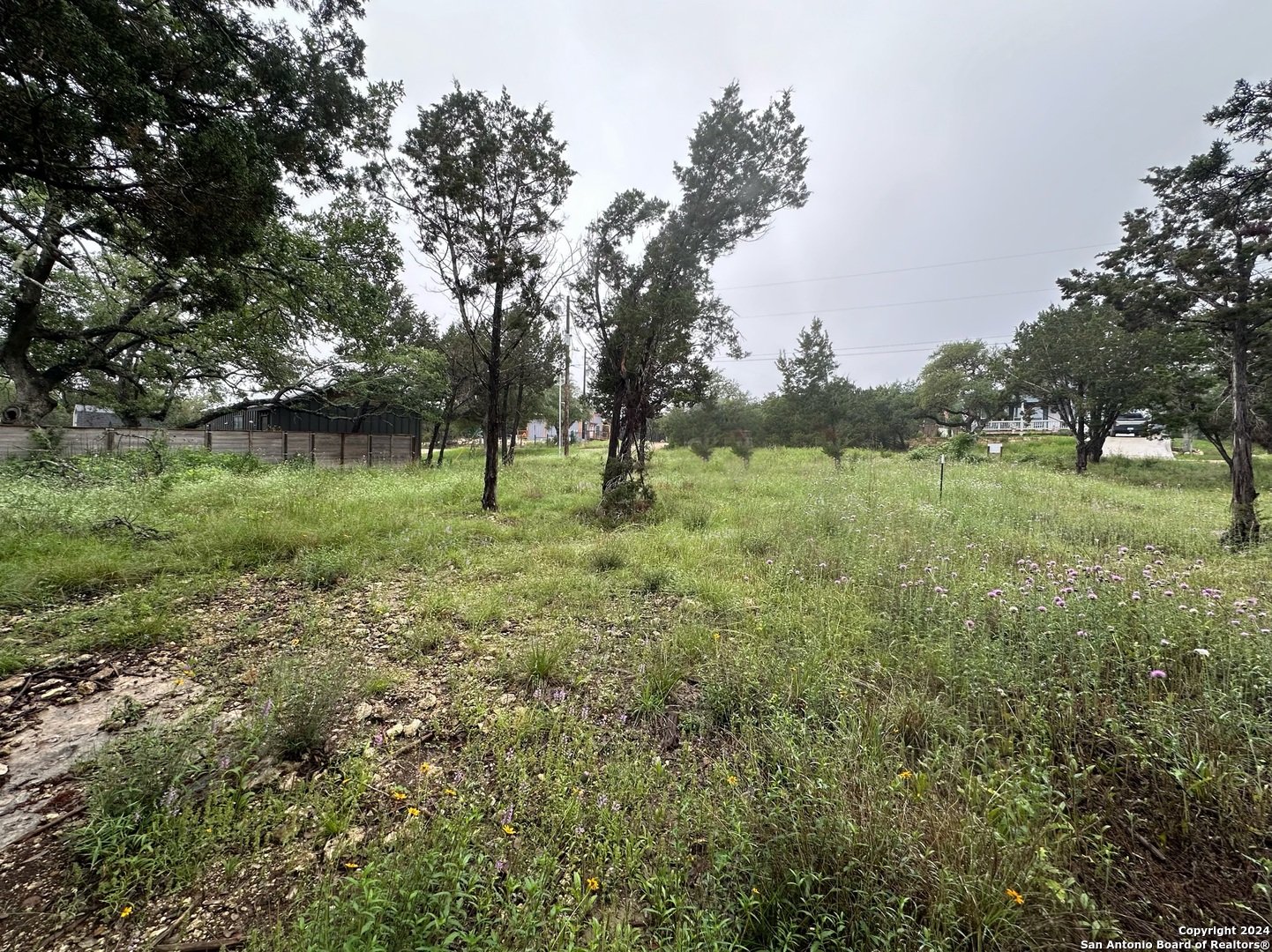 Tbd Stagecoach Trail Spring Branch, TX 78070 - Photo 12 of 12 a view of outdoor space with green field and trees all around