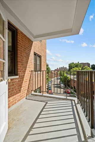 a view of a balcony with city view