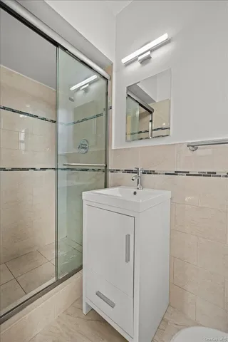 a bathroom with a sink and mirror