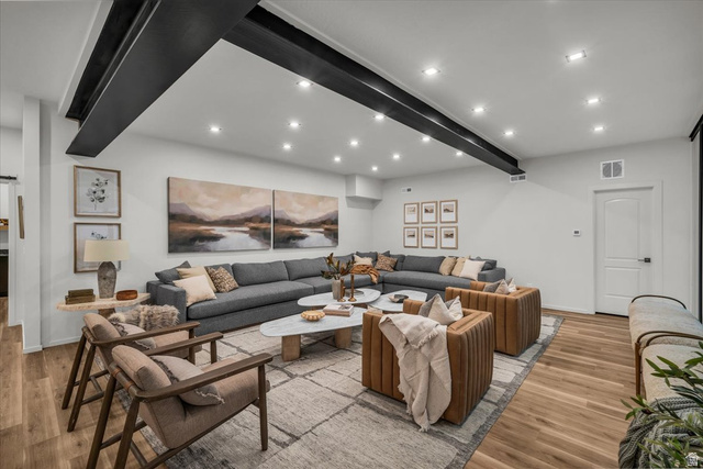 2152 South 30 West Orem, UT 84058 - Photo 33 of 56 Living area featuring beam ceiling, recessed lighting, and light wood finished floors