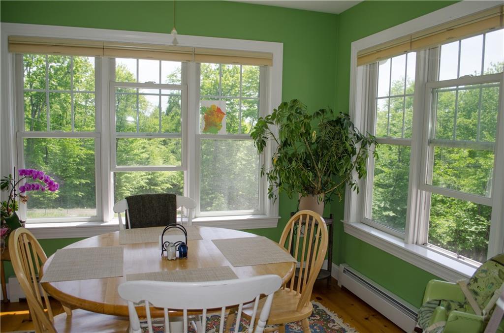 129 Lake Shore Road Holden, ME 04429 - Photo 12 of 29 4-season sunroom is a perfect place...
