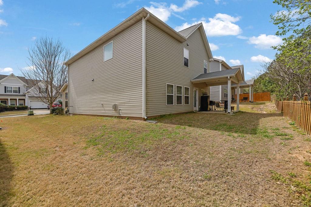 333 Nobleman Way Canton, GA 30114 - Photo 30 of 31 a view of a yard with a house