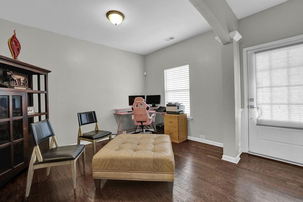 333 Nobleman Way Canton, GA 30114 - Photo 4 of 31 a bed room with furniture and a window